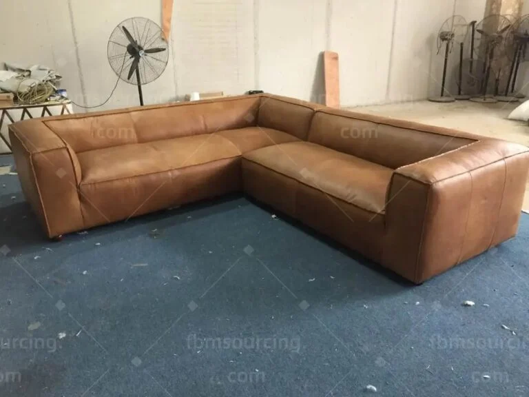 Leather sectional sofa seen from the other end at the inspection
