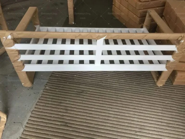 White slatted outdoor piece packed with corner protection