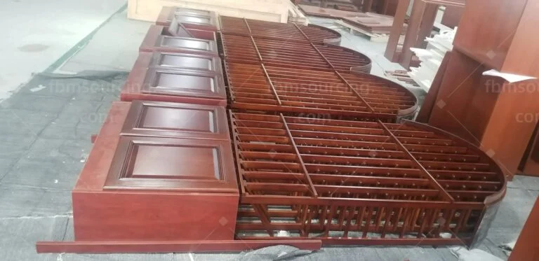 Timber rack units with raised-panel doors laid out at the inspection