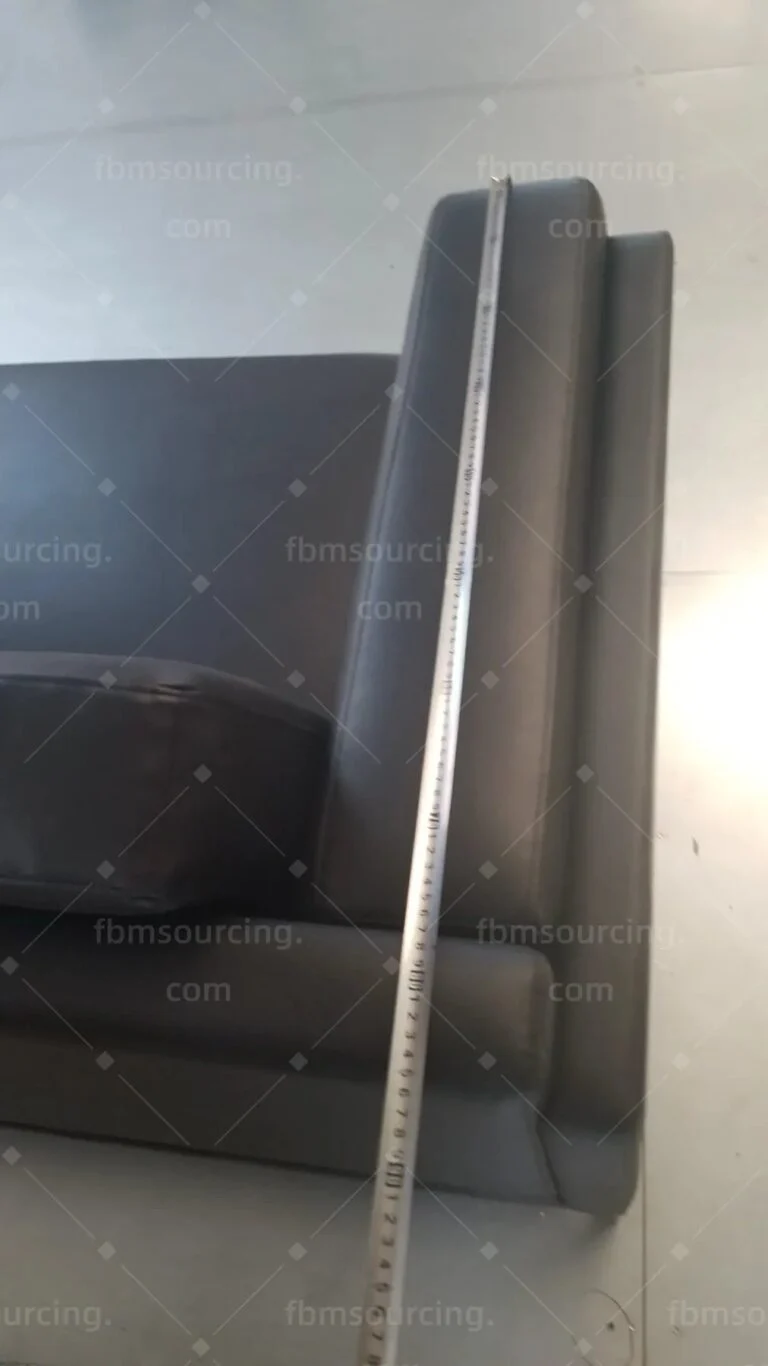 Back height of a leather sofa measured at the inspection