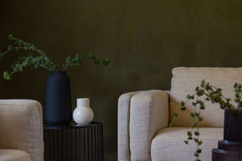 Bright lounge with upholstered armchairs and natural light