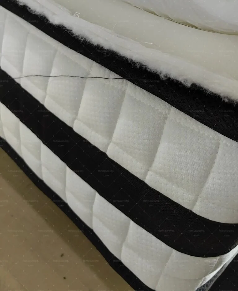 Hotel-grade mattress opened up at the inspection to show its layers