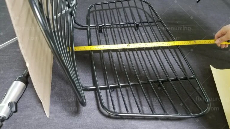 Wire chair seat measured across its width