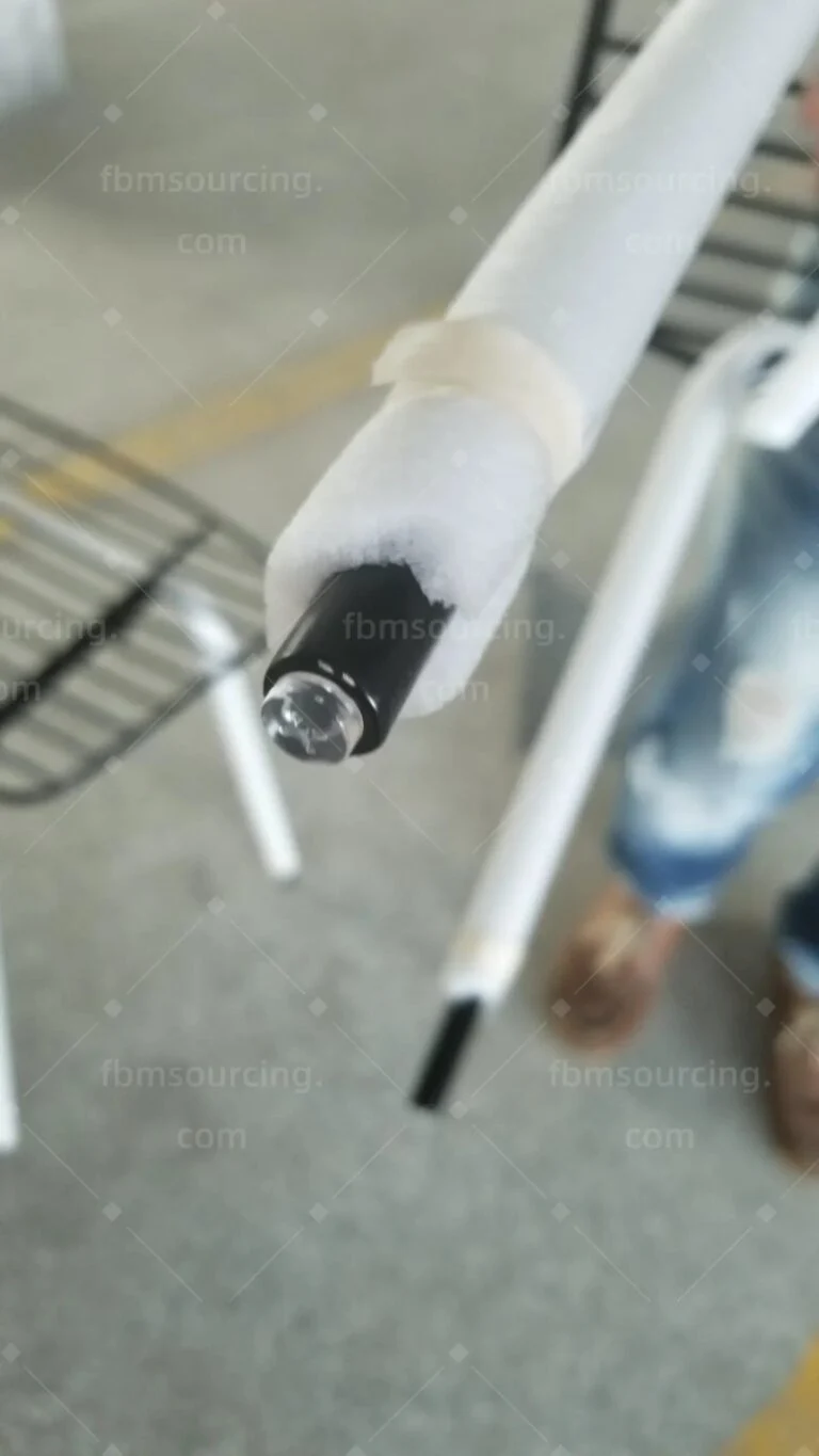 Chair foot wrapped in a protective foam sleeve for shipping