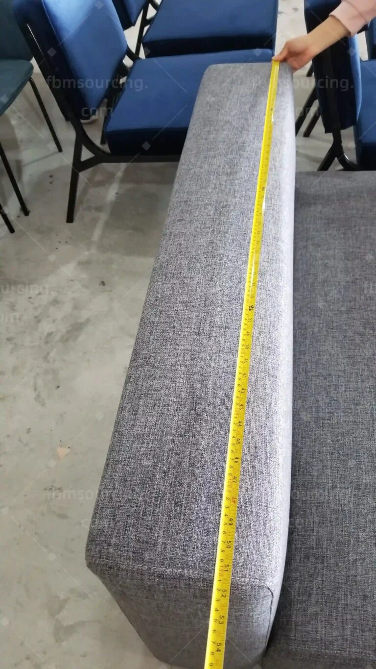 Grey fabric sofa module measured along its length