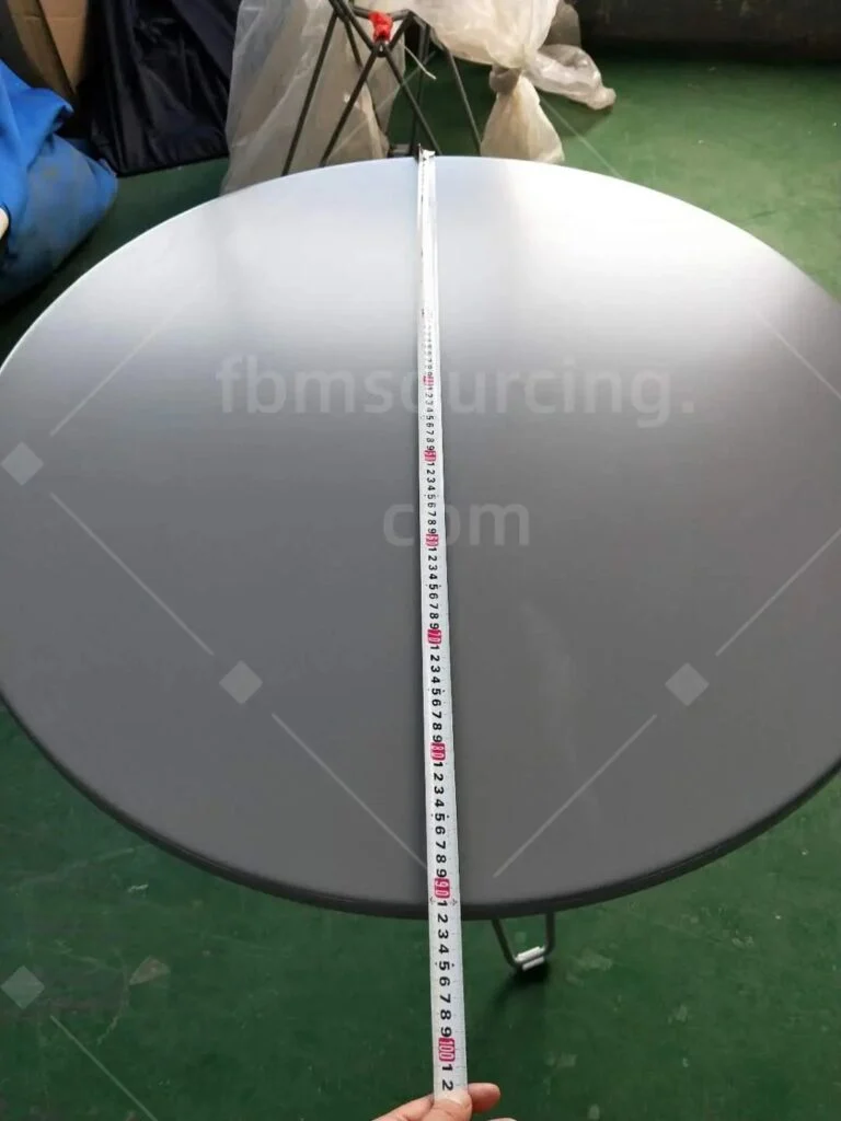 Round tabletop diameter measured with a tape