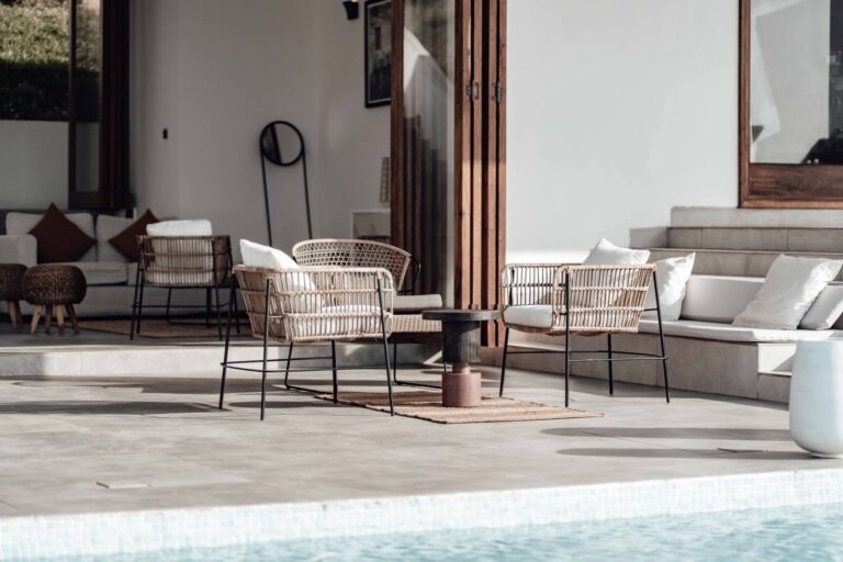 Pool terrace with slim-frame outdoor lounge chairs